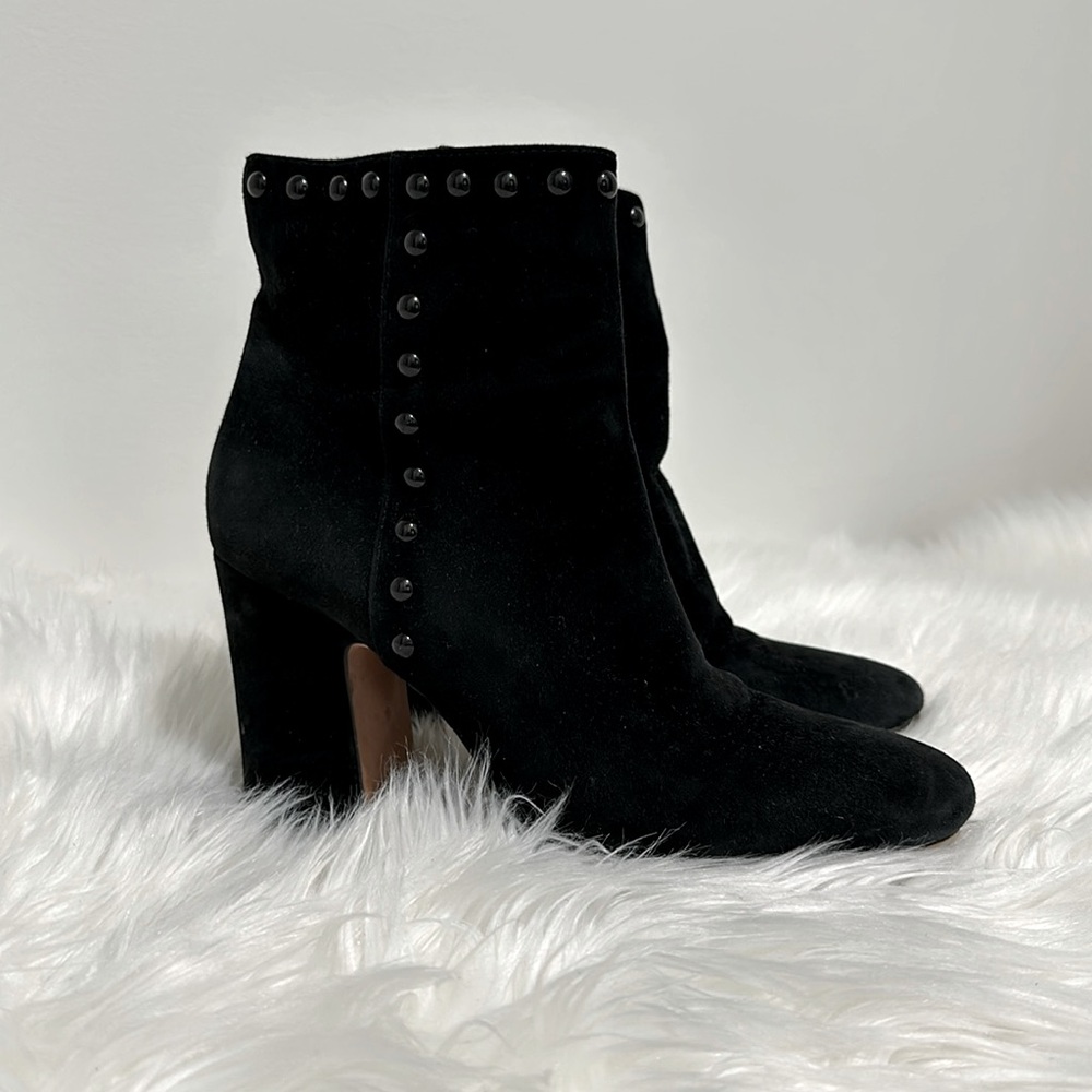Black suede Felicia Coach booties.